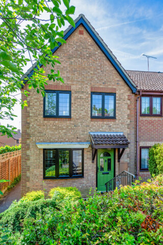 Black Slimline uPVC Windows and Composite Front Door Sheerwater Glass