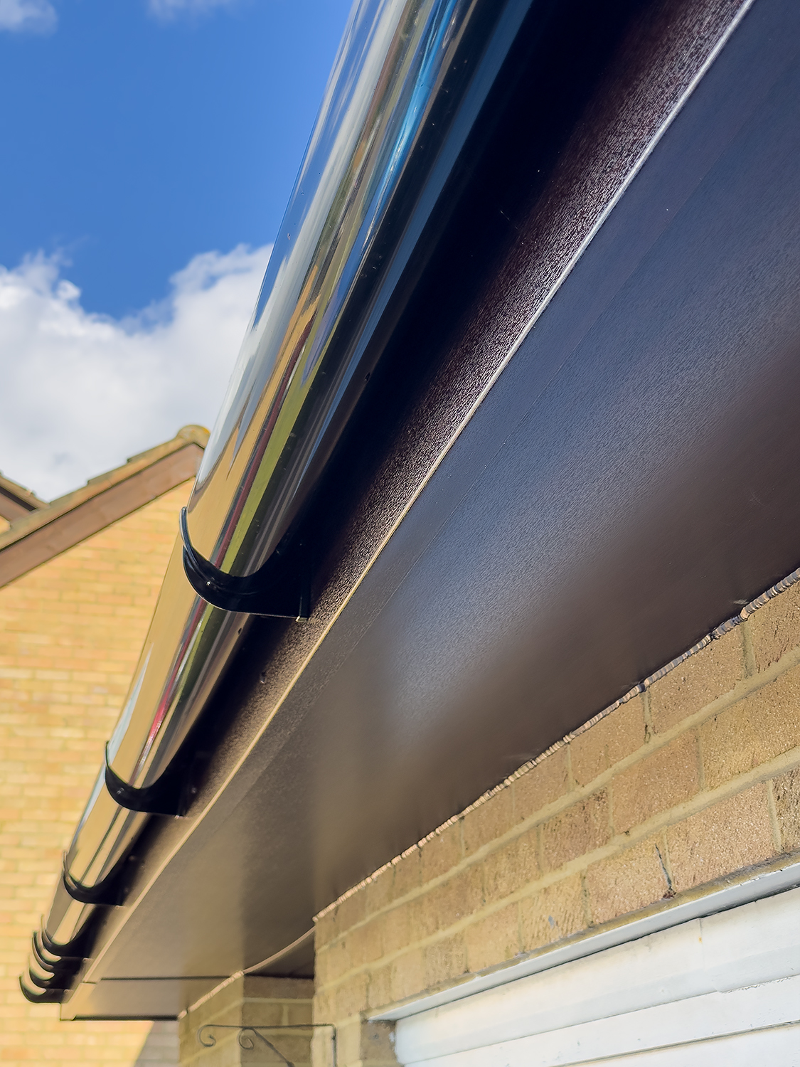 Rosewood Roofline gutters soffits Woking Sheerwater Glass